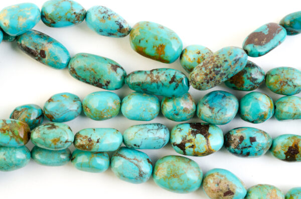 Graduated Long Drill Oval Blue Tibetan Stabilized Turquoise Bead Strands